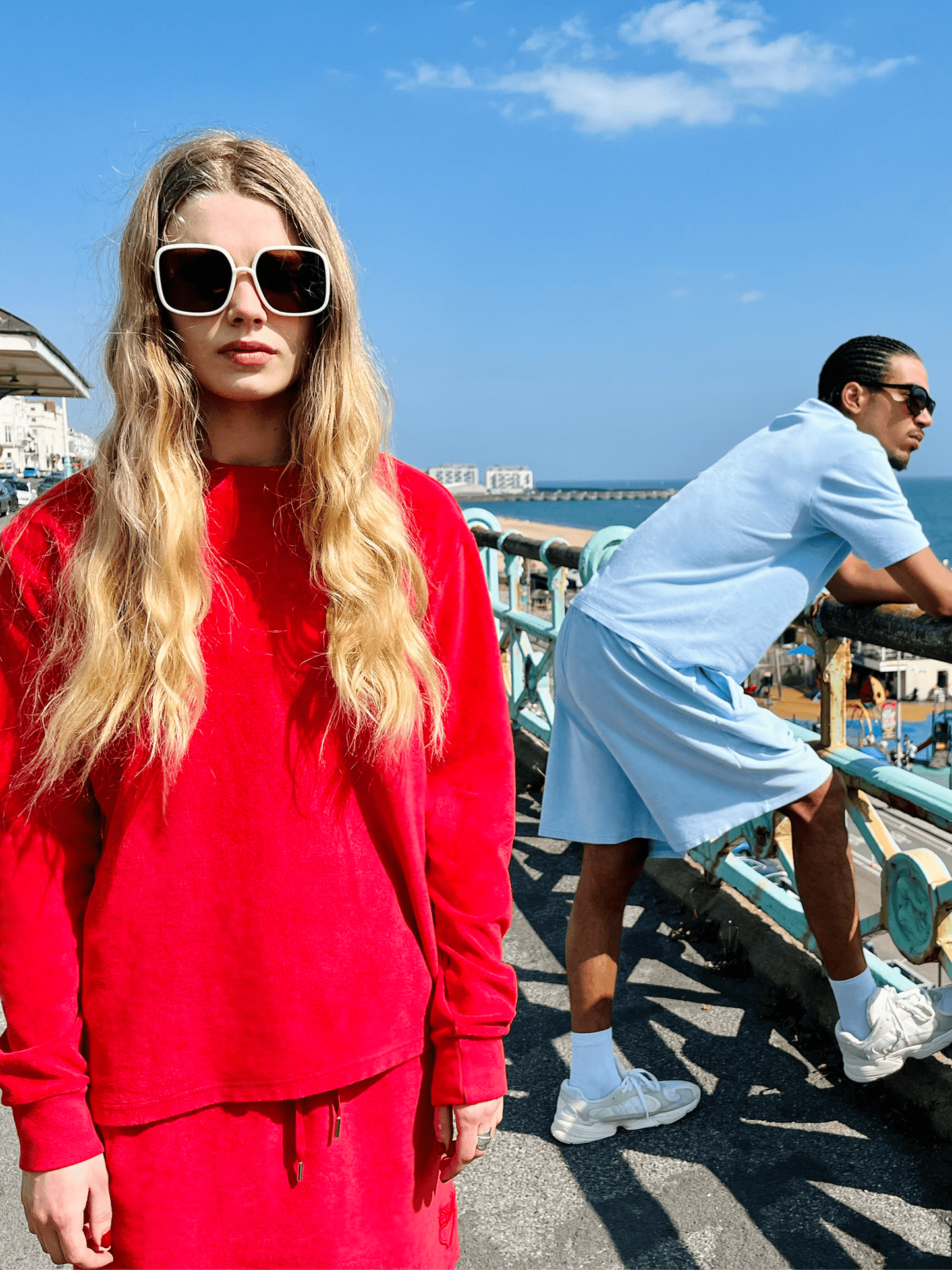 woman in sunglasses wearing Organic Terry Long-sleeve in lucky red