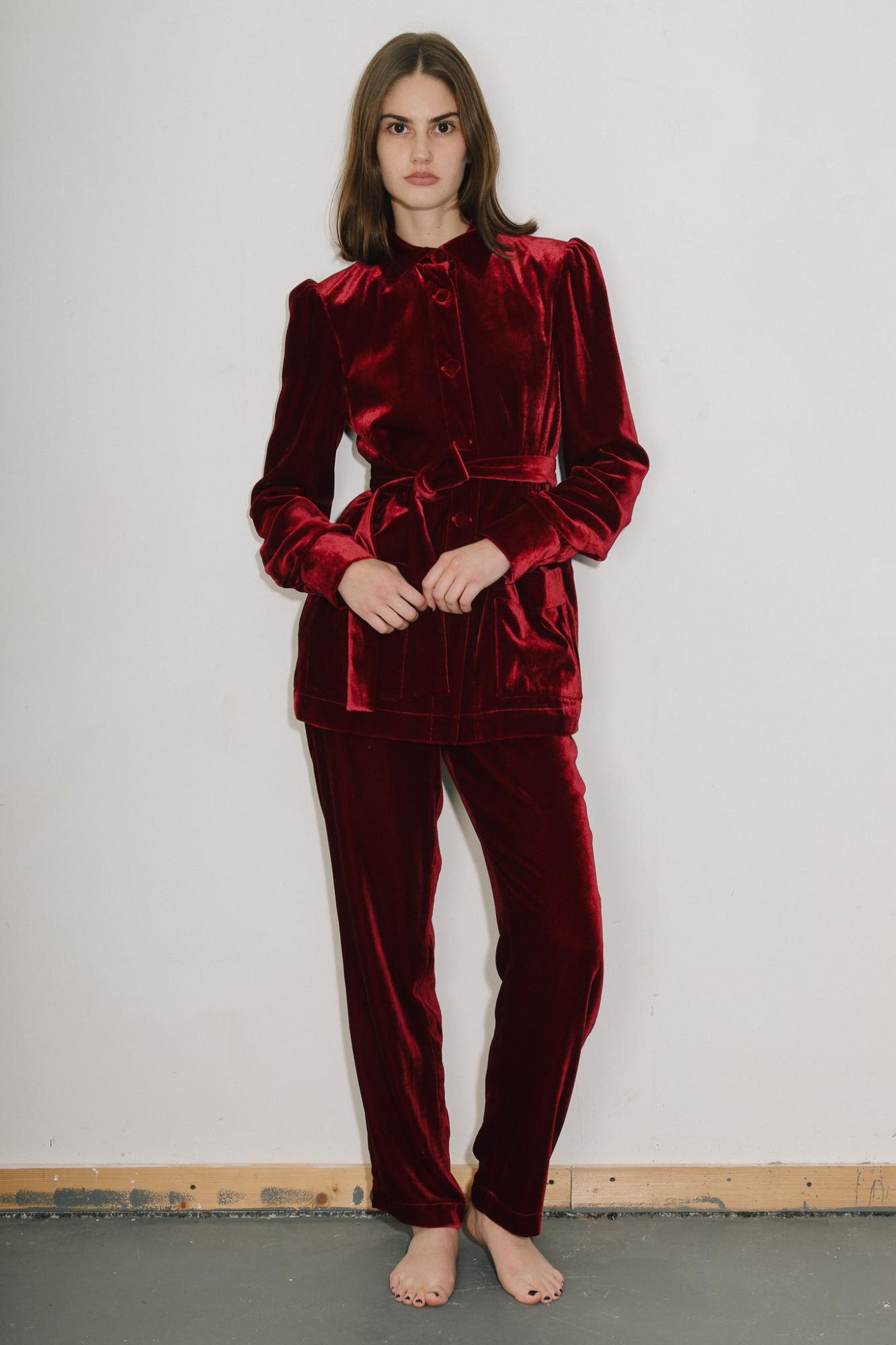 woman wearing the velvet Gentlewomen Trousers and Jacket in red. Front view