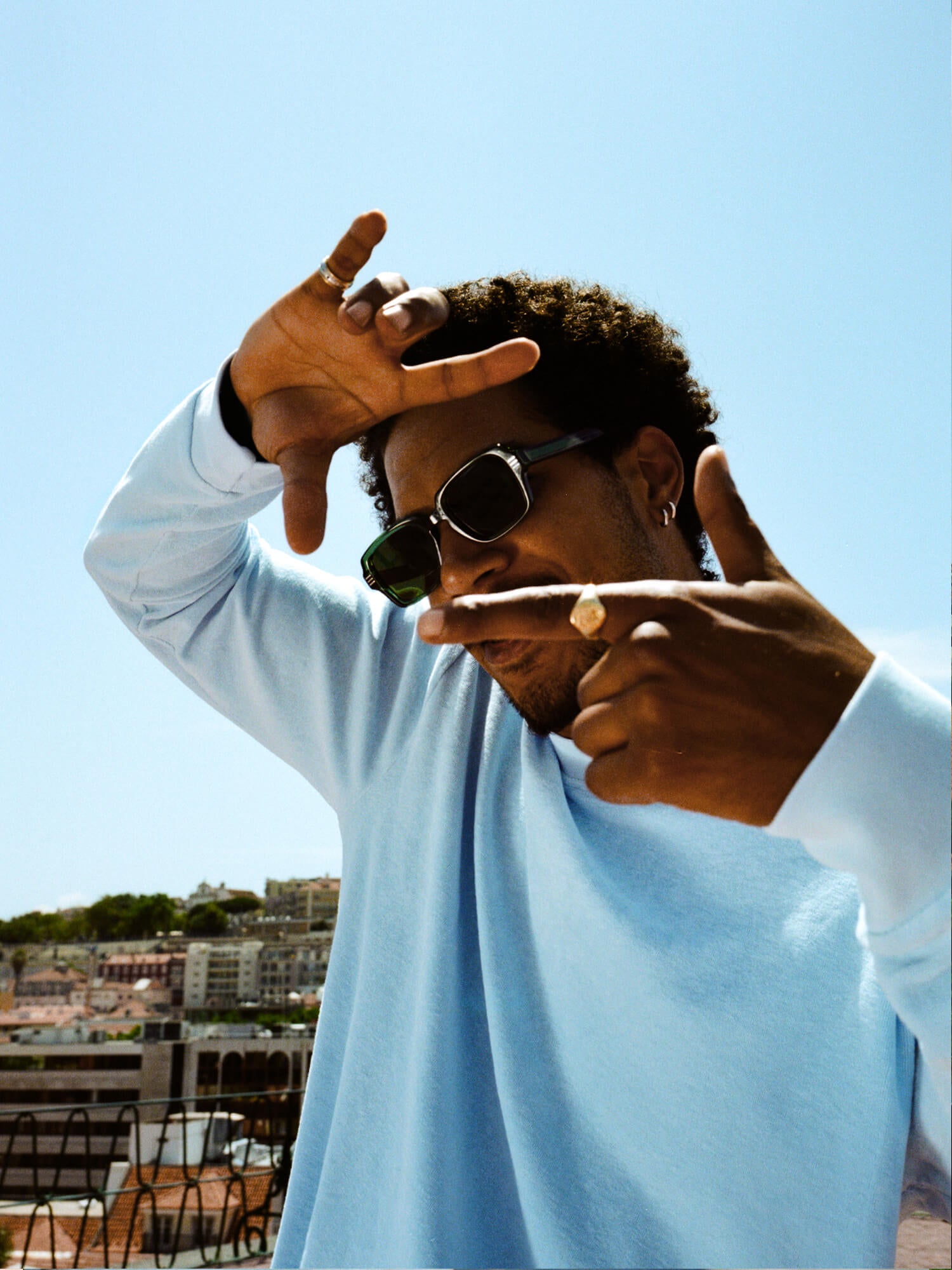 man wearing Organic Terry Long-sleeve in sky blue in sunglasses
