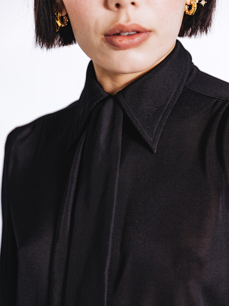 woman modelling Slinky Pique Shirt in black