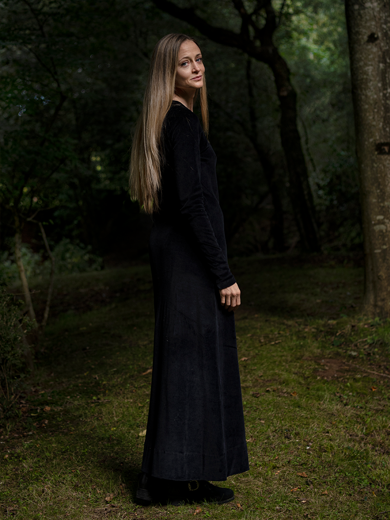 woman in forest modelling Organic Velour Dress in black