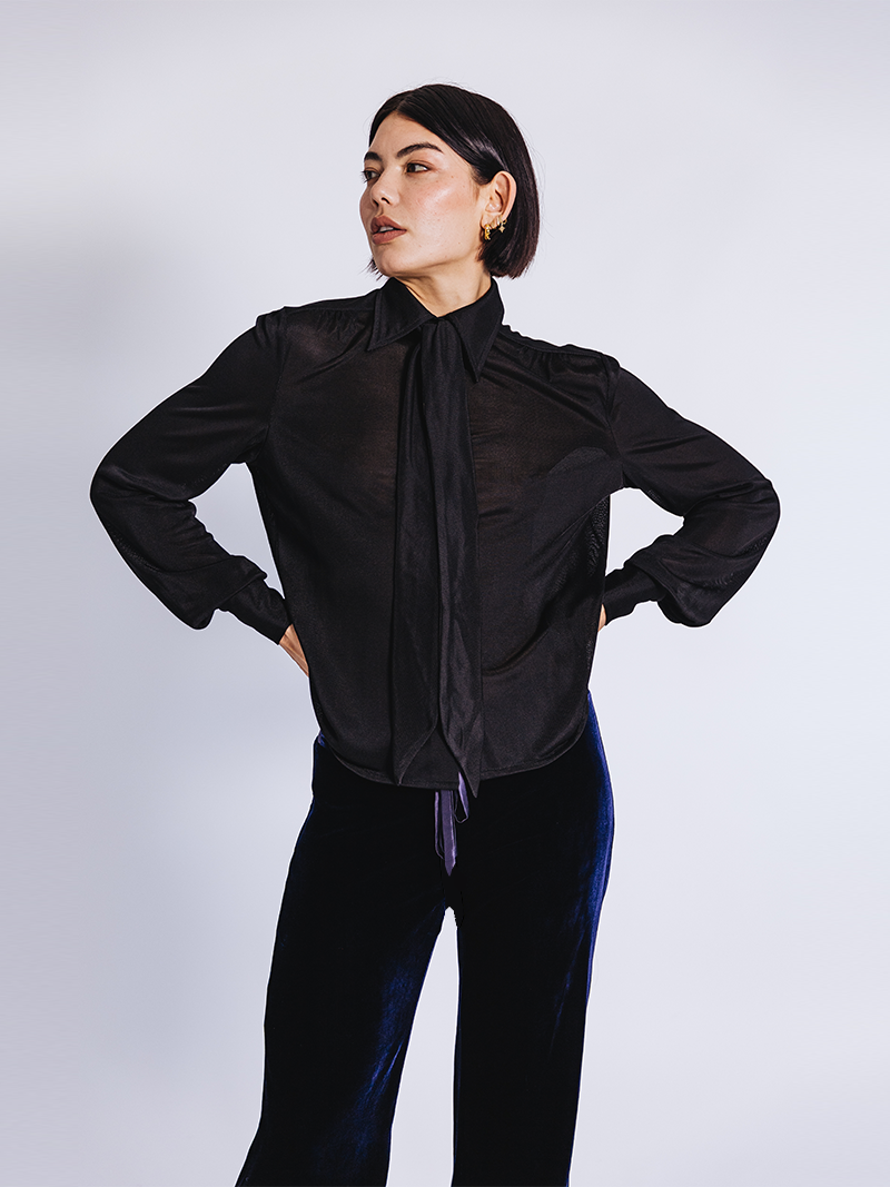 woman modelling Slinky Pique Shirt in black