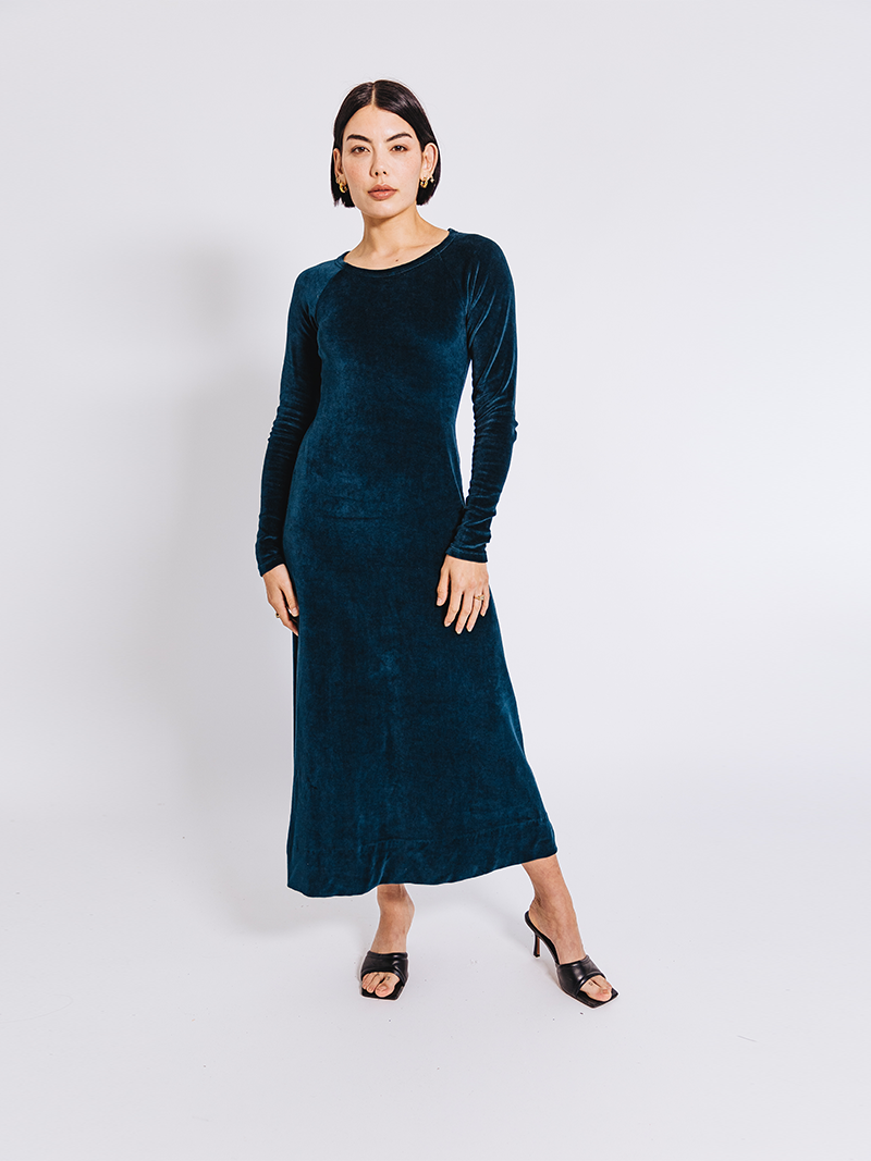 woman modelling Organic Velour Dress in green