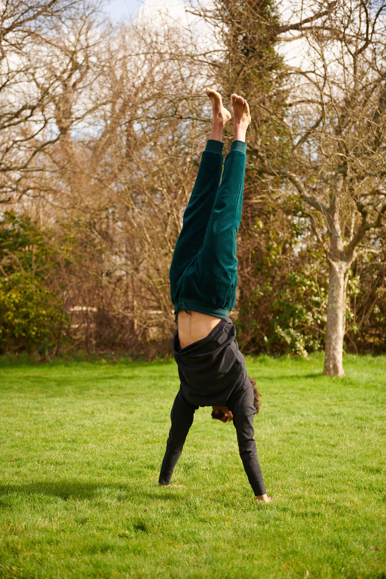 person doing handstand in Organic Velour Tracksuit Bottoms