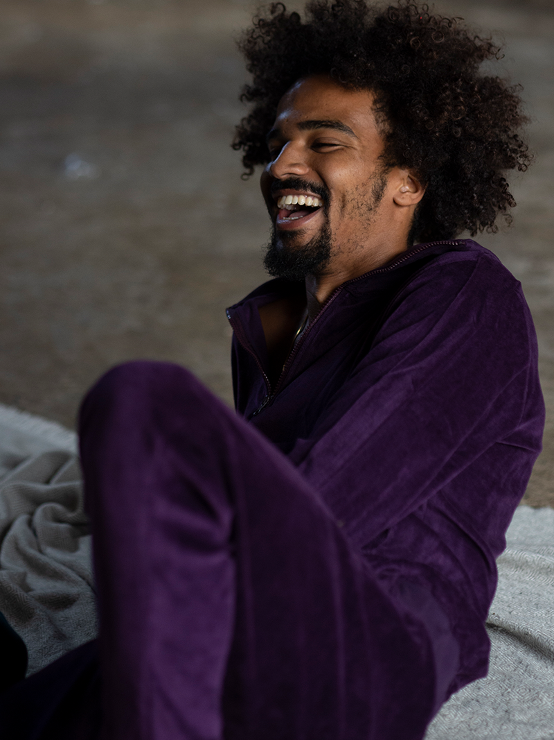 man laughing in Organic Velour Zip Jumper in royal purple