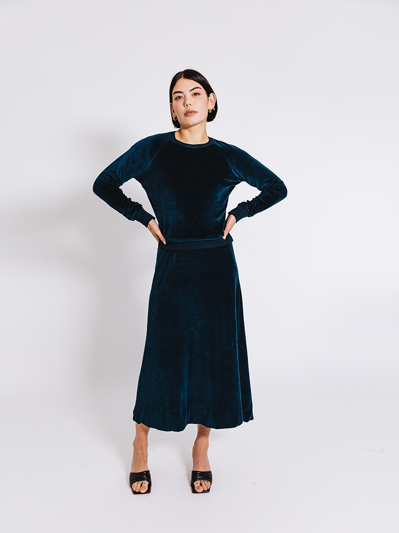 woman modelling Organic Velour Dress in green