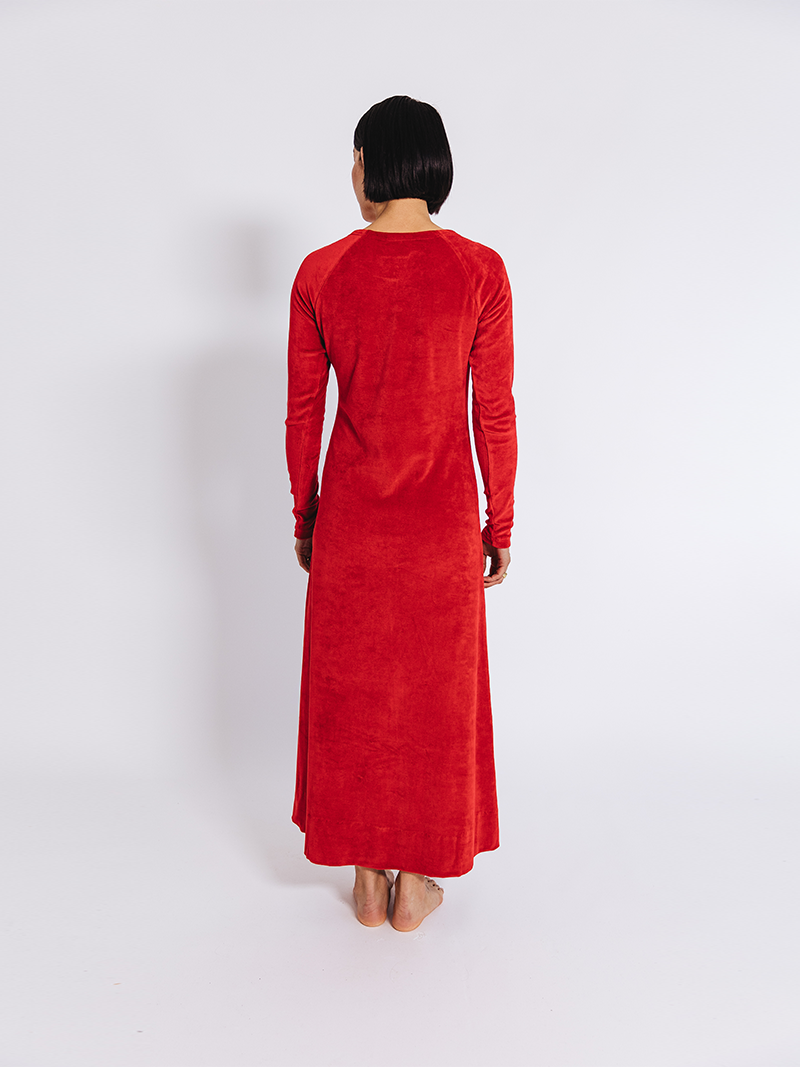 woman modelling Organic Velour Dress in red